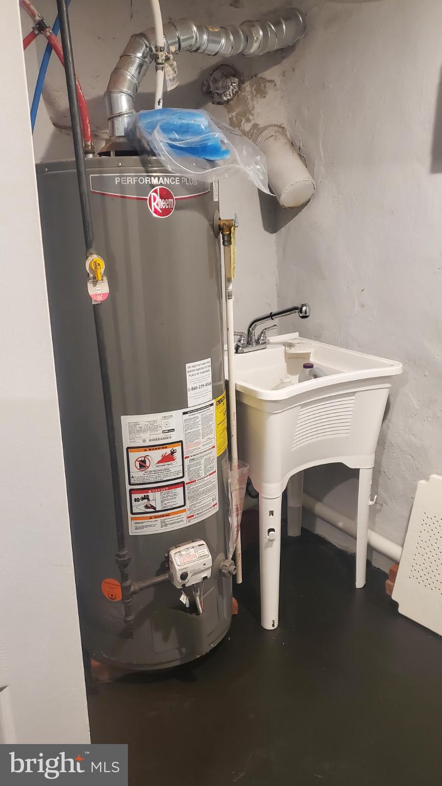 7311 North 21st Street Philadelphia, PA 19138 - Photo 15 of 15 New Rheem h/w tank and laundry sink