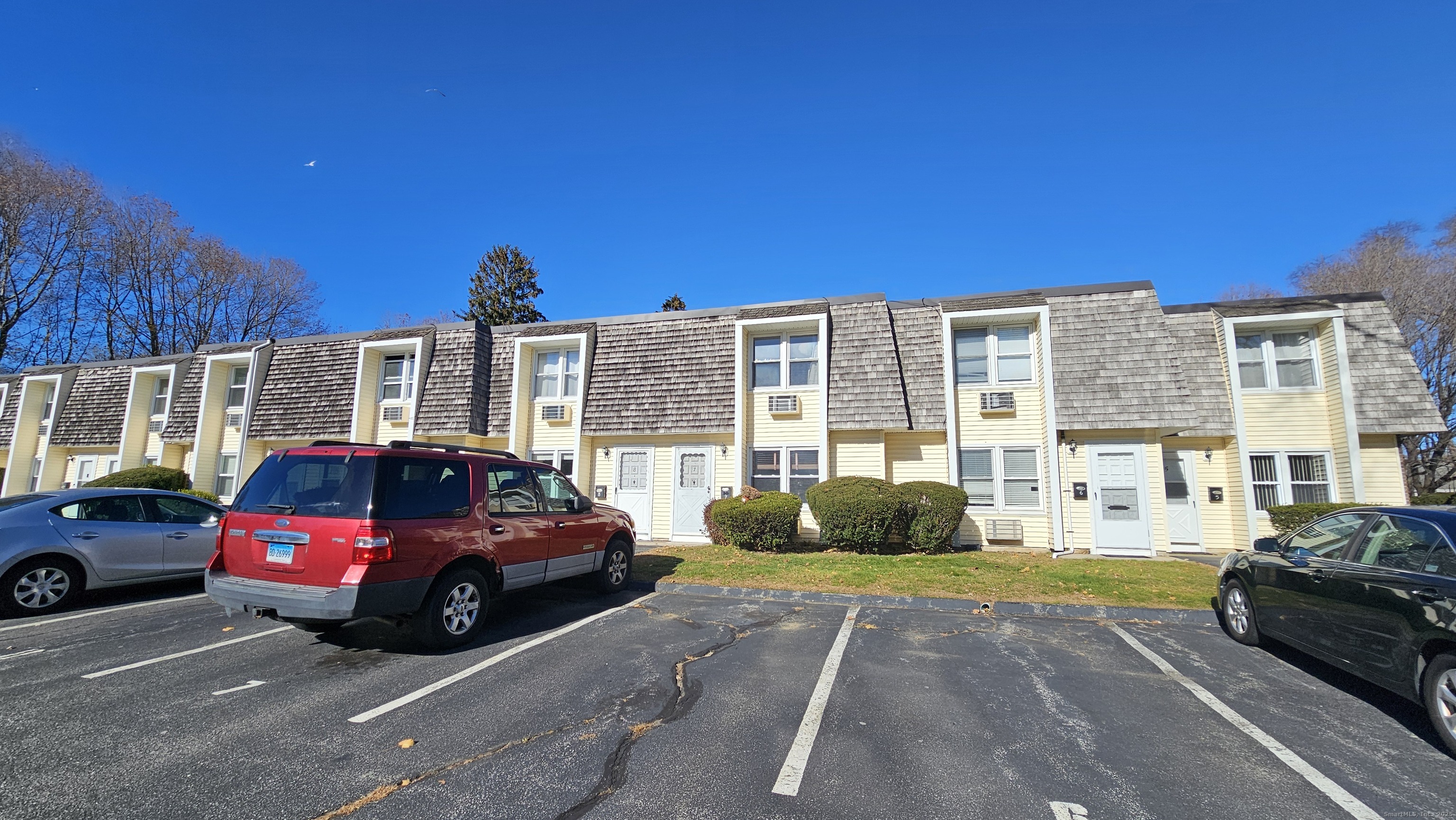 127 Black Point Road, Unit 7 East Lyme, CT 06357 - Photo 3 of 15 a view of a car parked in front of a house
