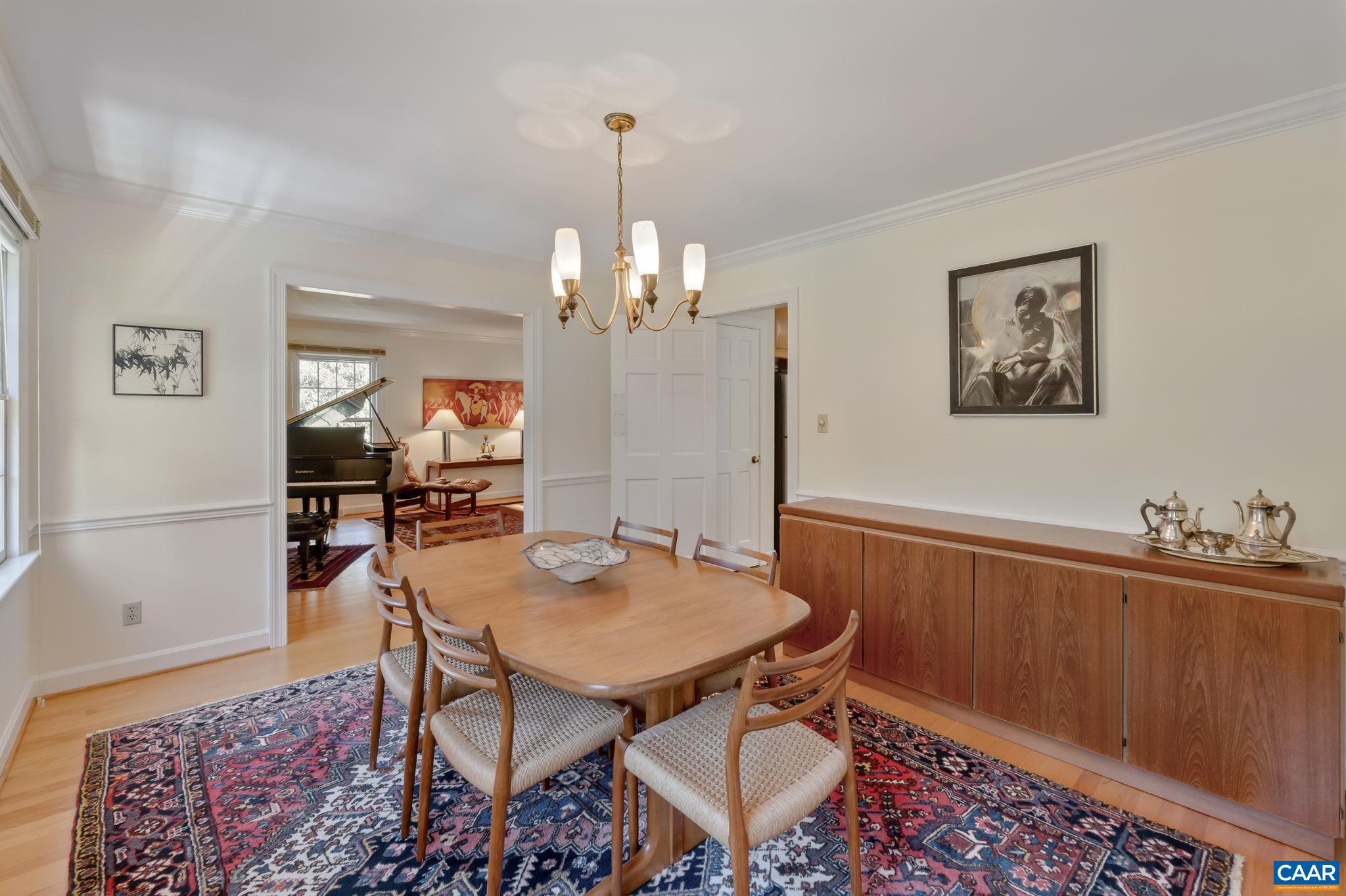 311 Gloucester Road Charlottesville, VA 22901 - Photo 19 of 55 a view of a dining room with furniture