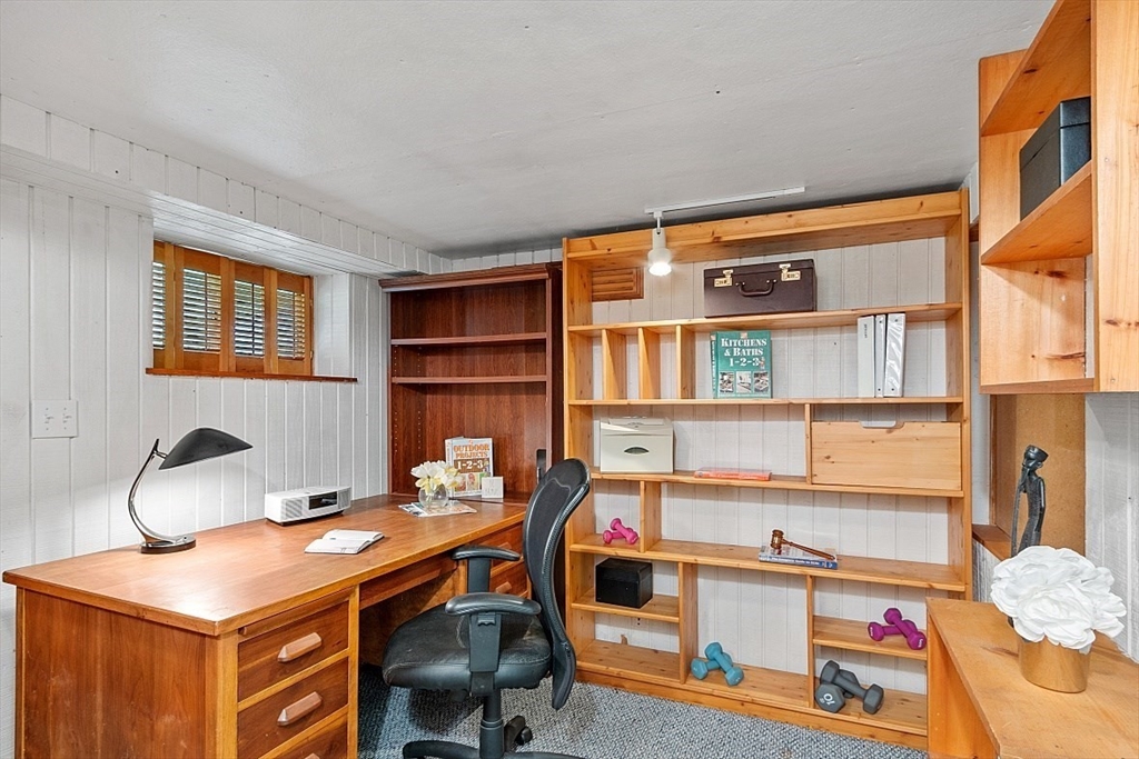 130 Adams Road Concord, MA 01742 - Photo 26 of 33 a room with furniture a air conditioner and a window