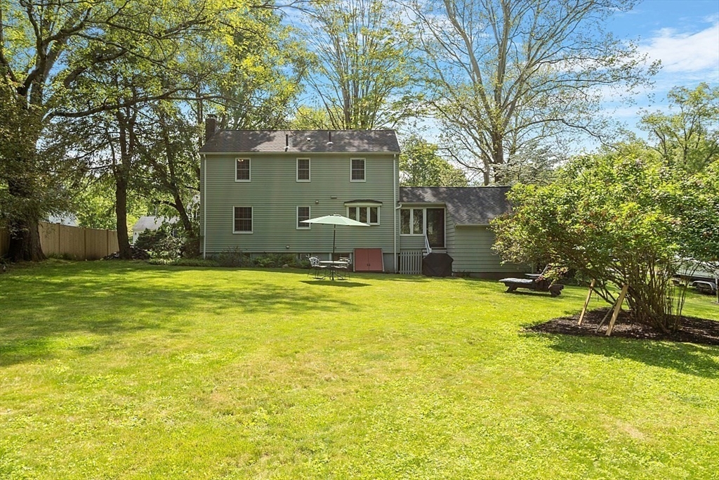 130 Adams Road Concord, MA 01742 - Photo 30 of 33 a view of a house with a yard