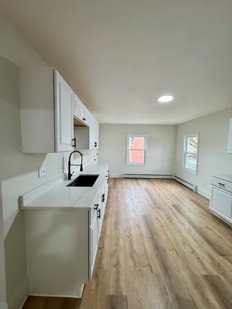a view of livingroom with hardwood floor and window