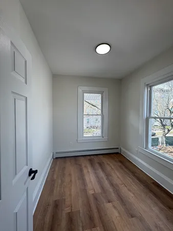 a view of an empty room and window