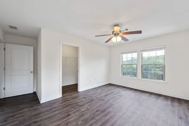 a kitchen with a sink and a mirror