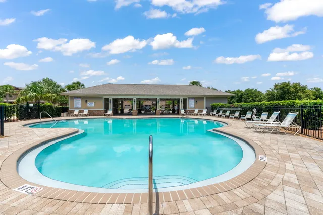 a view of a house with swimming pool