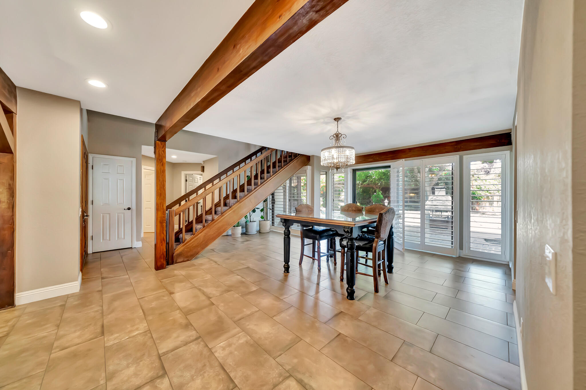 39844 Golfers Drive Palmdale, CA 93551 - Photo 14 of 87 a view of a dining room with furniture window and outside view