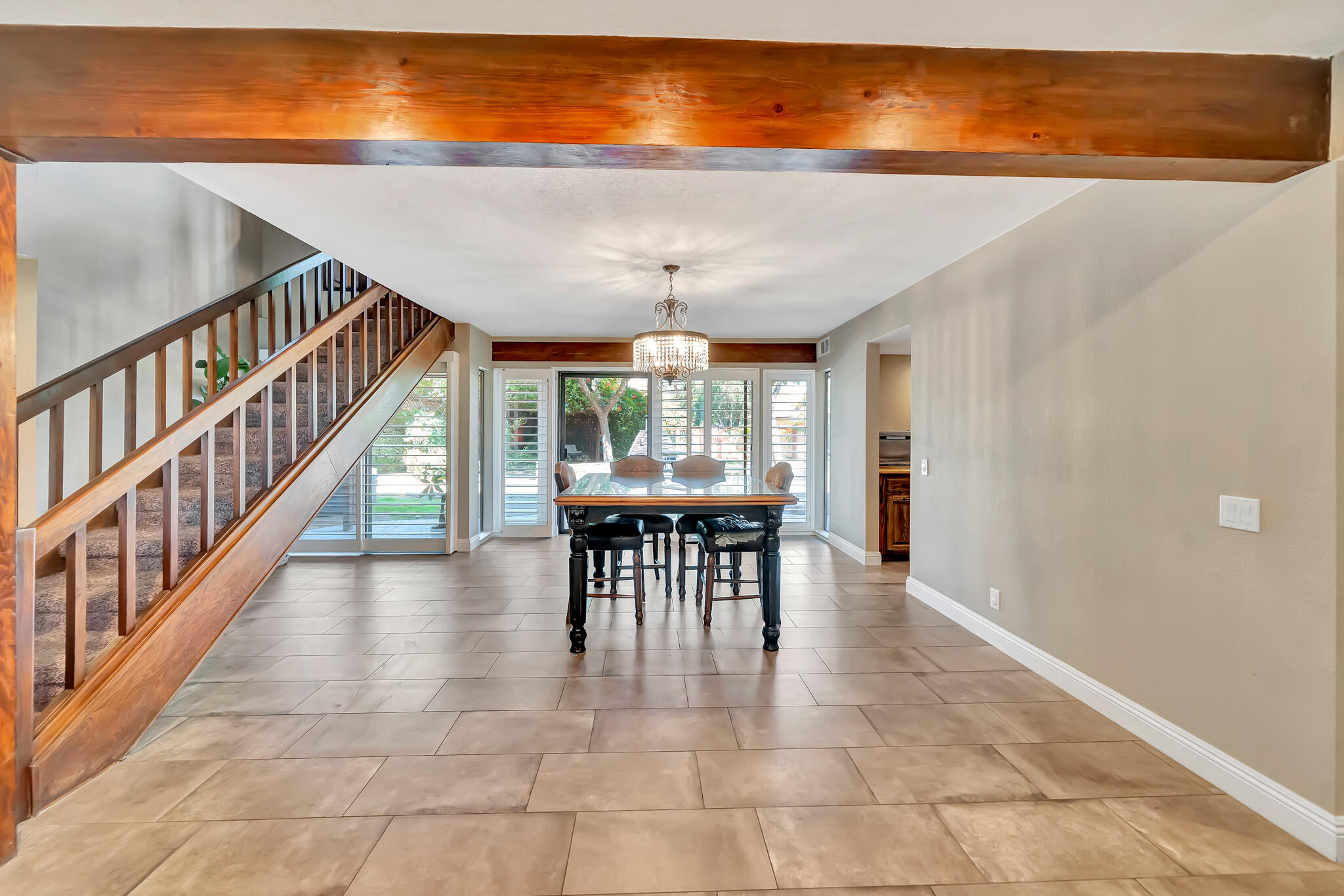 39844 Golfers Drive Palmdale, CA 93551 - Photo 16 of 87 a view of a dining room with furniture window and outside view