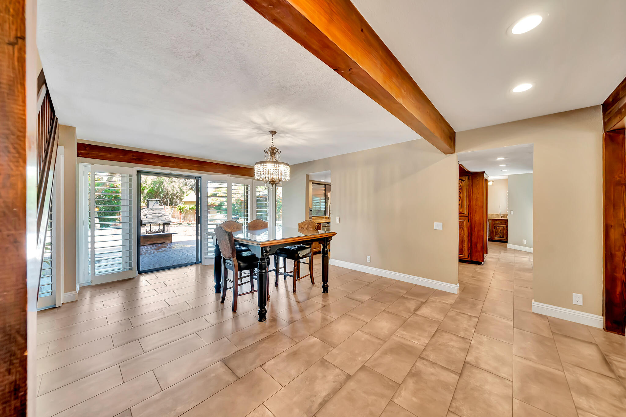 39844 Golfers Drive Palmdale, CA 93551 - Photo 17 of 87 a view of a dining room with furniture window and outside view