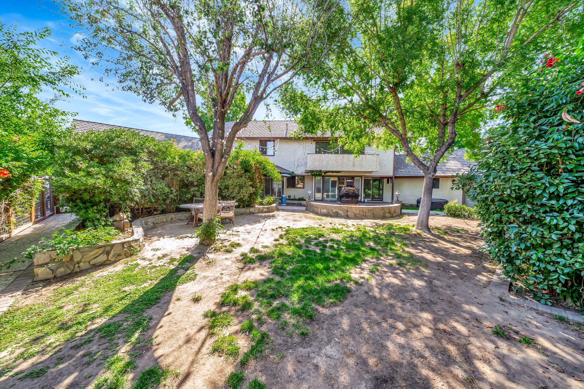 39844 Golfers Drive Palmdale, CA 93551 - Photo 64 of 87 a front view of a house with yard and green space