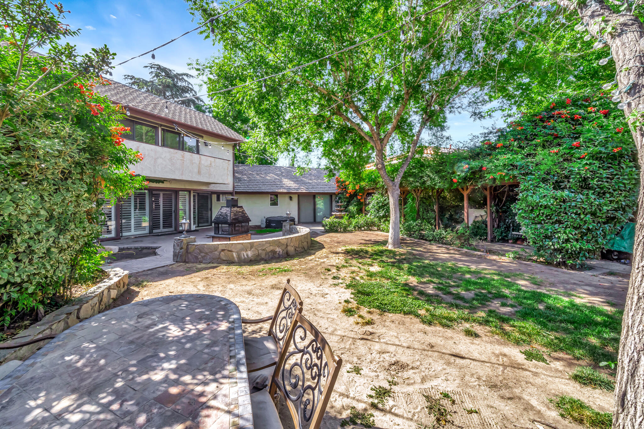 39844 Golfers Drive Palmdale, CA 93551 - Photo 69 of 87 a view of a house with swimming pool and sitting area