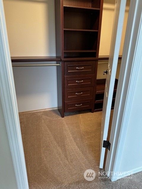 3004 200th Place Southeast Bothell, WA 98012 - Photo 15 of 24 a view of walk in closet with empty racks