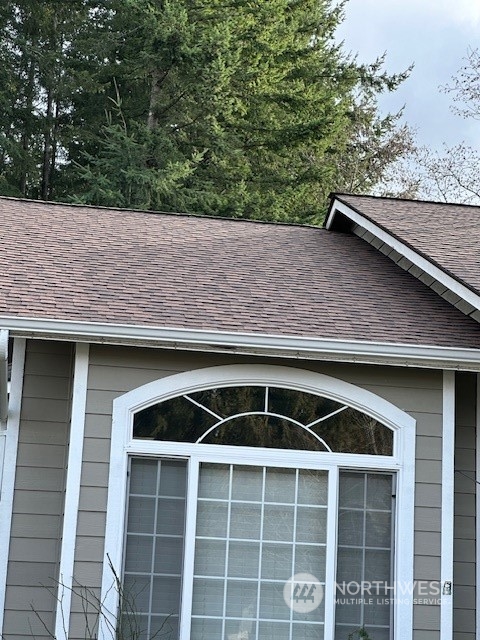 3004 200th Place Southeast Bothell, WA 98012 - Photo 22 of 24 a front view of a house with a yard