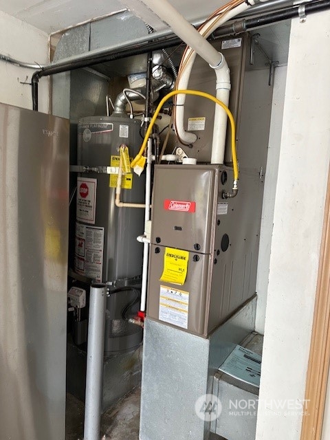 3004 200th Place Southeast Bothell, WA 98012 - Photo 24 of 24 a utility room with dryer and washer
