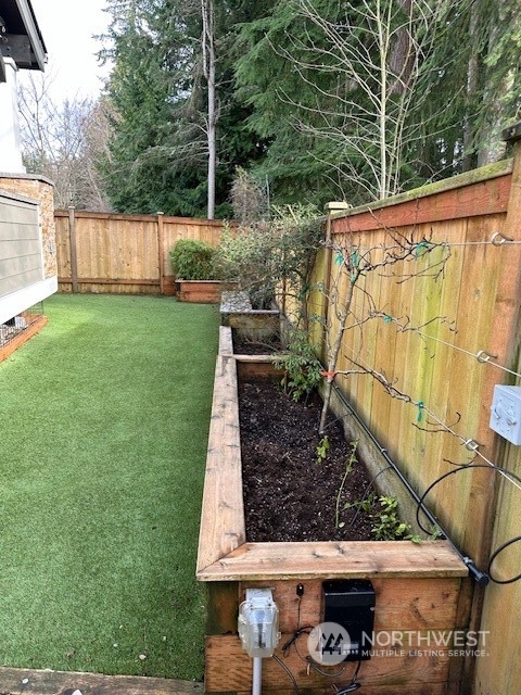 3004 200th Place Southeast Bothell, WA 98012 - Photo 3 of 24 a view of a backyard with sitting area