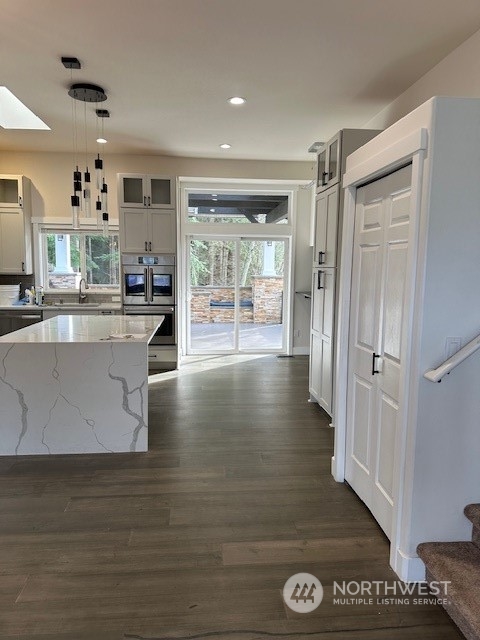 3004 200th Place Southeast Bothell, WA 98012 - Photo 7 of 24 a view of kitchen with furniture and wooden floor