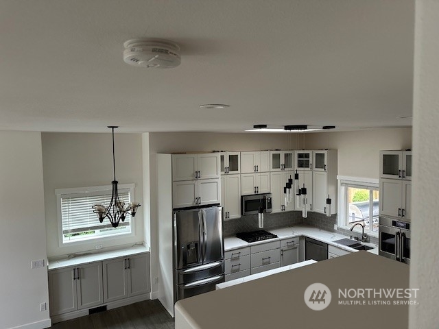 3004 200th Place Southeast Bothell, WA 98012 - Photo 9 of 24 a living room with a couch and a table