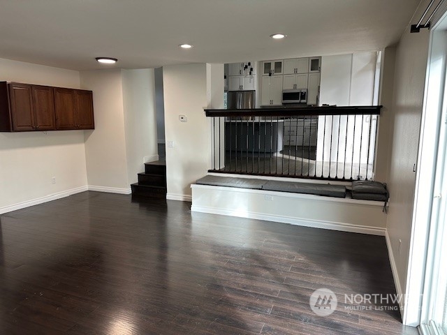 3004 200th Place Southeast Bothell, WA 98012 - Photo 10 of 24 a view of kitchen with refrigerator and microwave