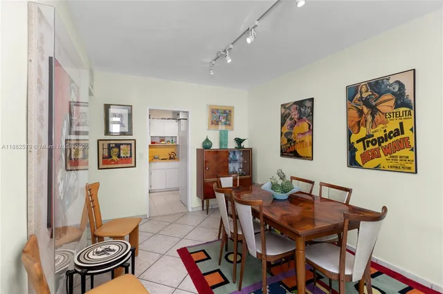 a view of a dining room with furniture wooden floor and a rug