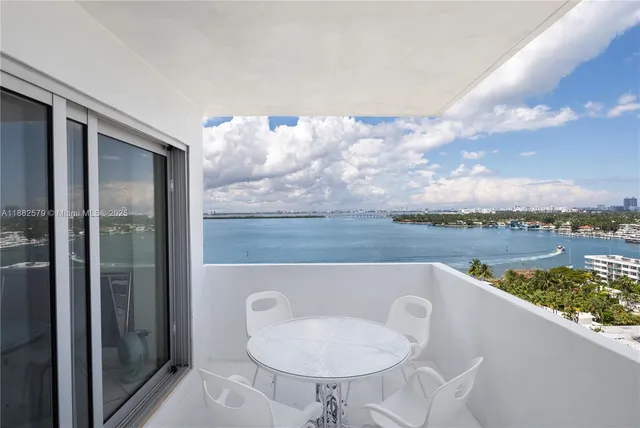 a view of a lake from a corridor