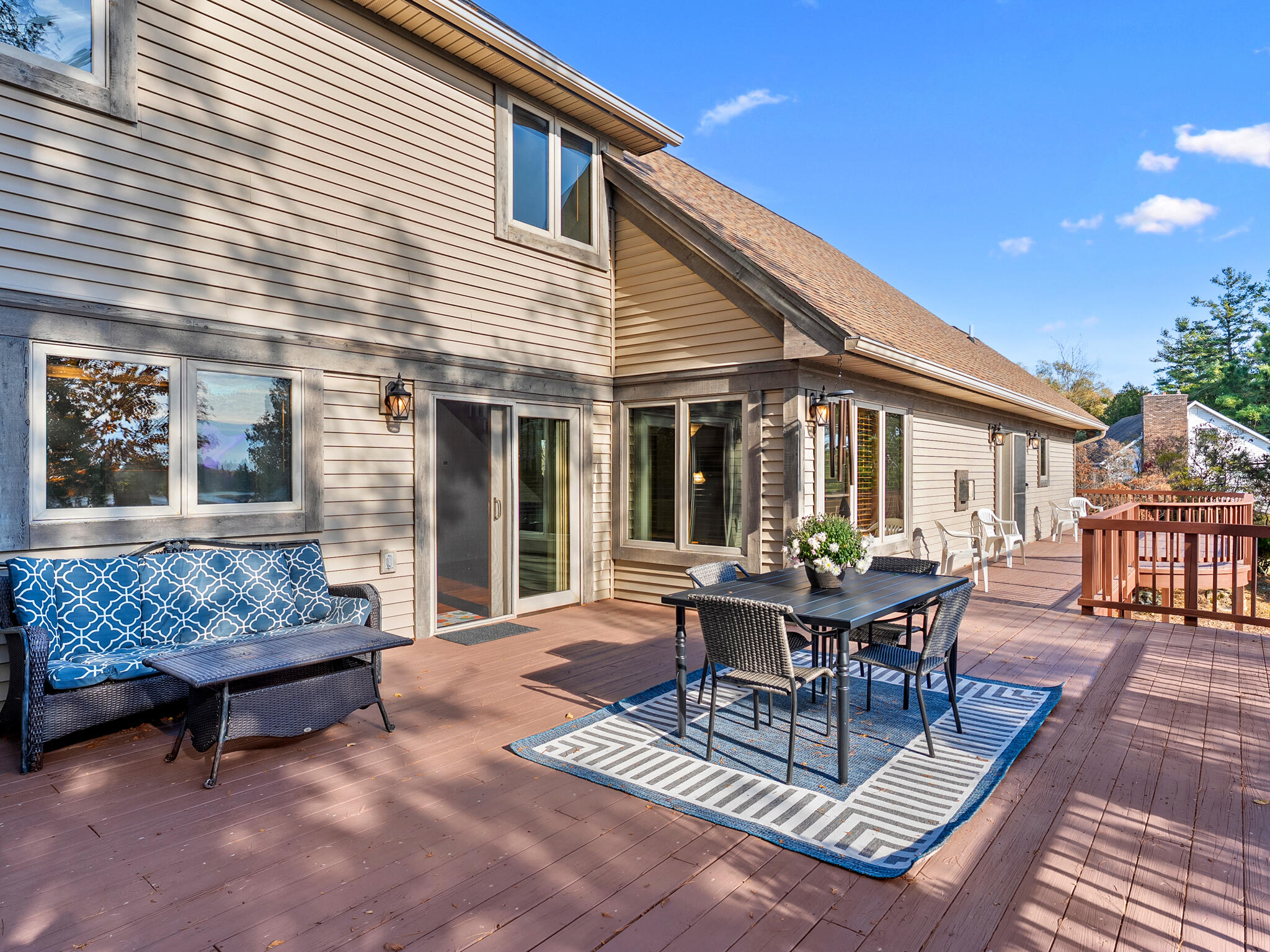 212 Long Rapids Road Alpena, MI 49707 - Photo 60 of 77 Sprawling Deck