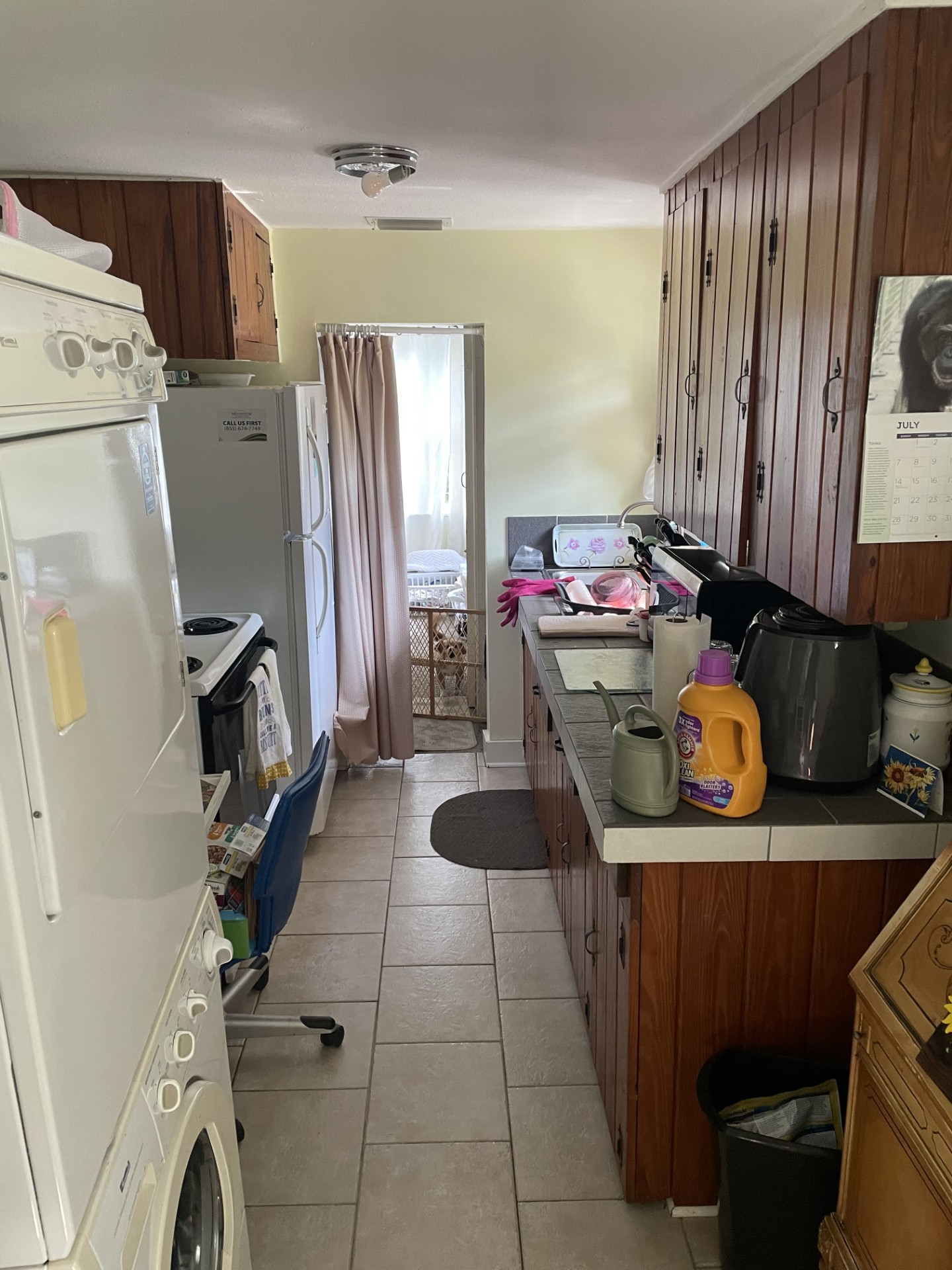 514 South 6th Street Fernandina Beach, FL 32034 - Photo 15 of 15 a kitchen with stainless steel appliances a sink a stove a refrigerator and cabinets