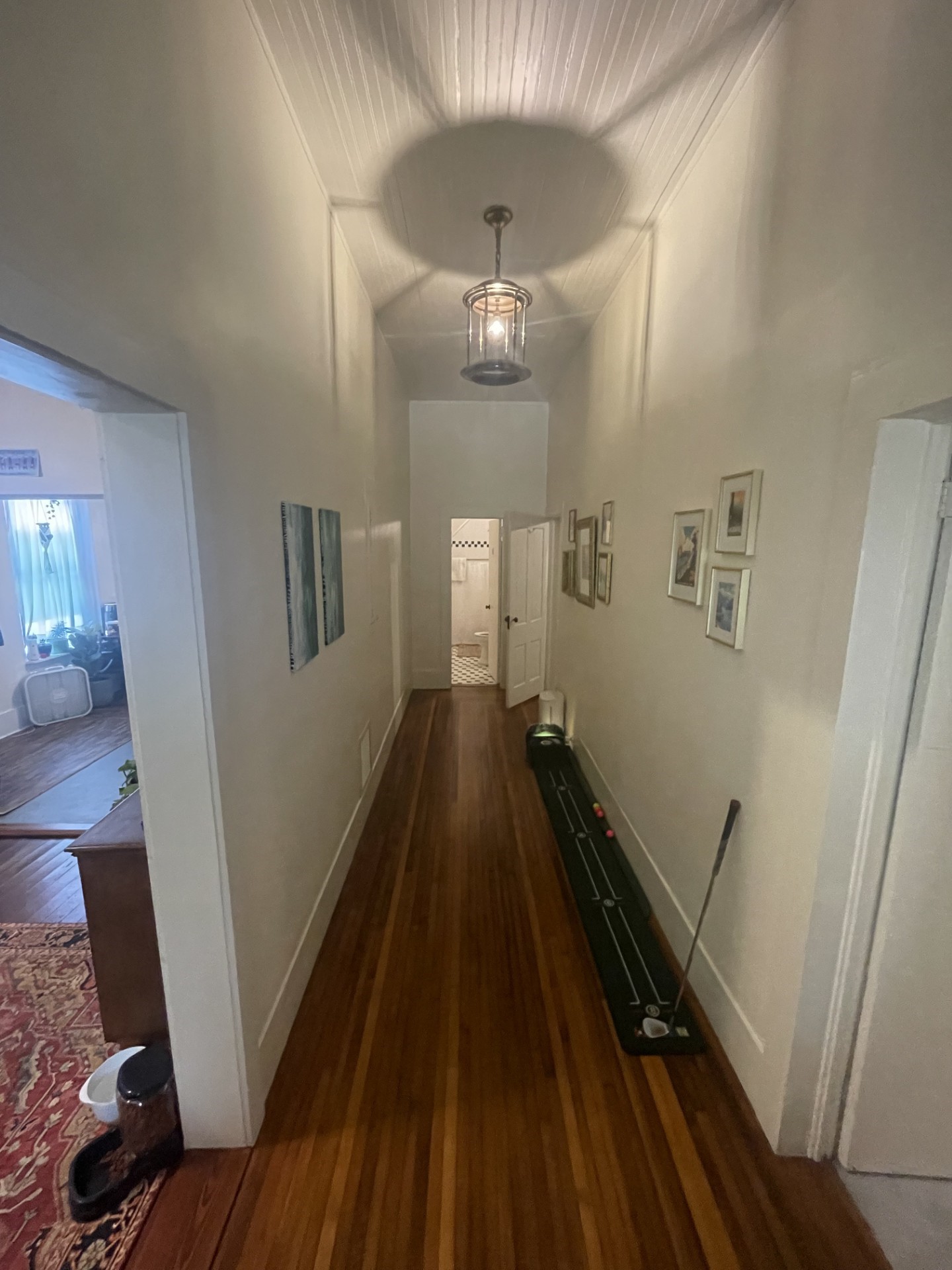 514 South 6th Street Fernandina Beach, FL 32034 - Photo 10 of 15 a view of a hallway with wooden floor and staircase