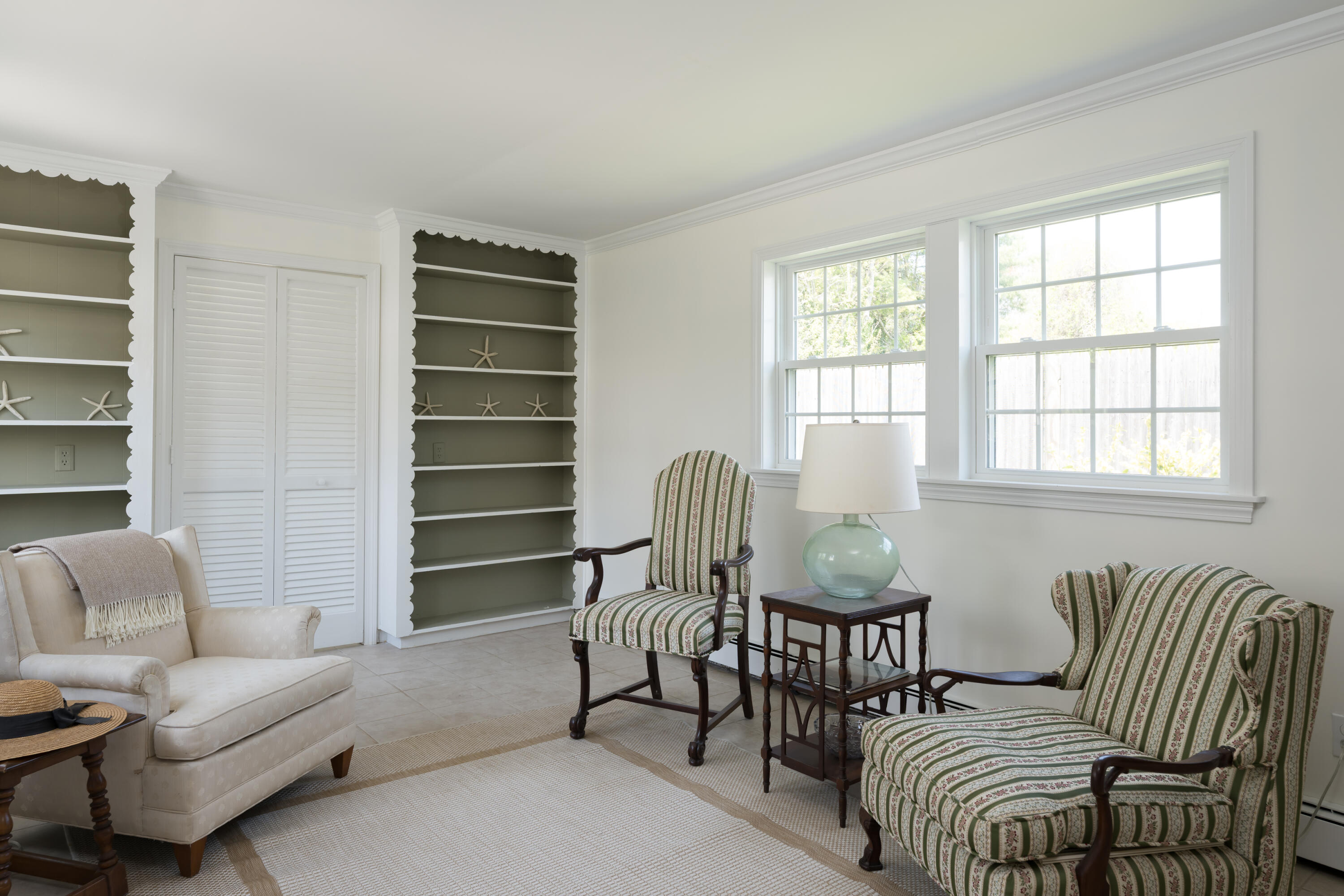 111 Lewis Road West Yarmouth, MA 02673 - Photo 24 of 43 a living room with furniture a lamp and a window