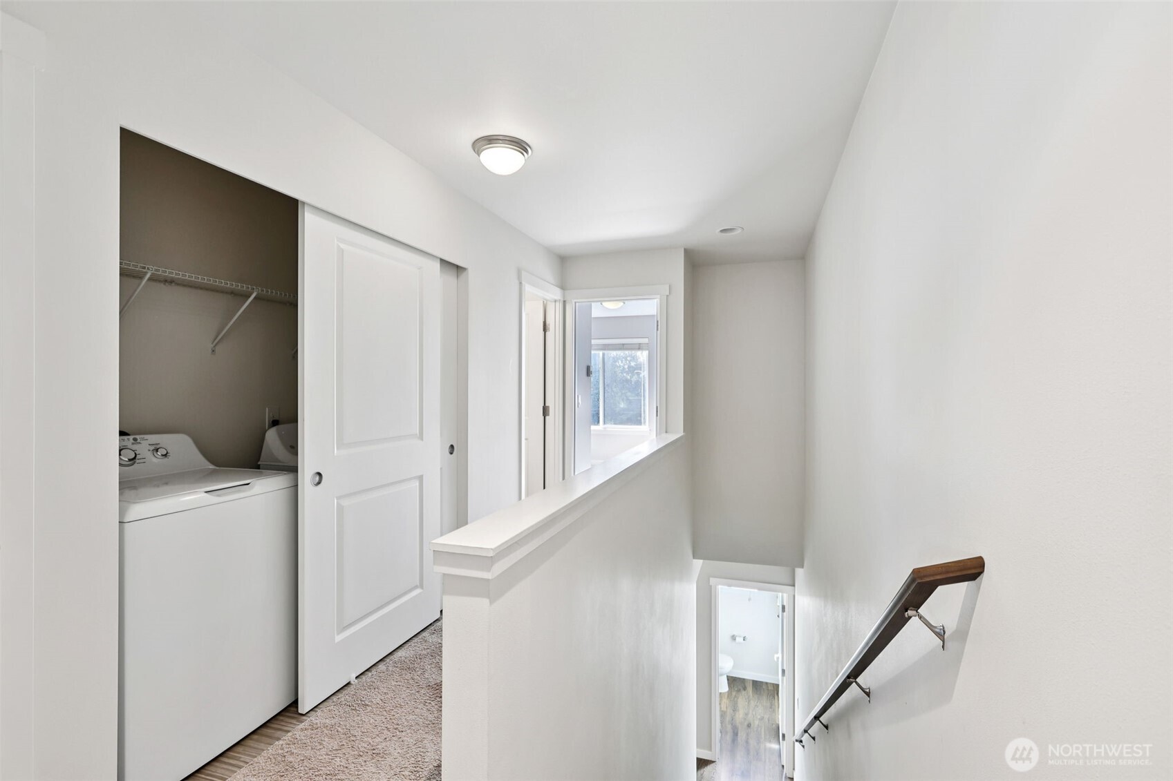 19403 7th Avenue West, Unit C1 Lynnwood, WA 98036 - Photo 23 of 40 a view of a hallway with closet and utility room