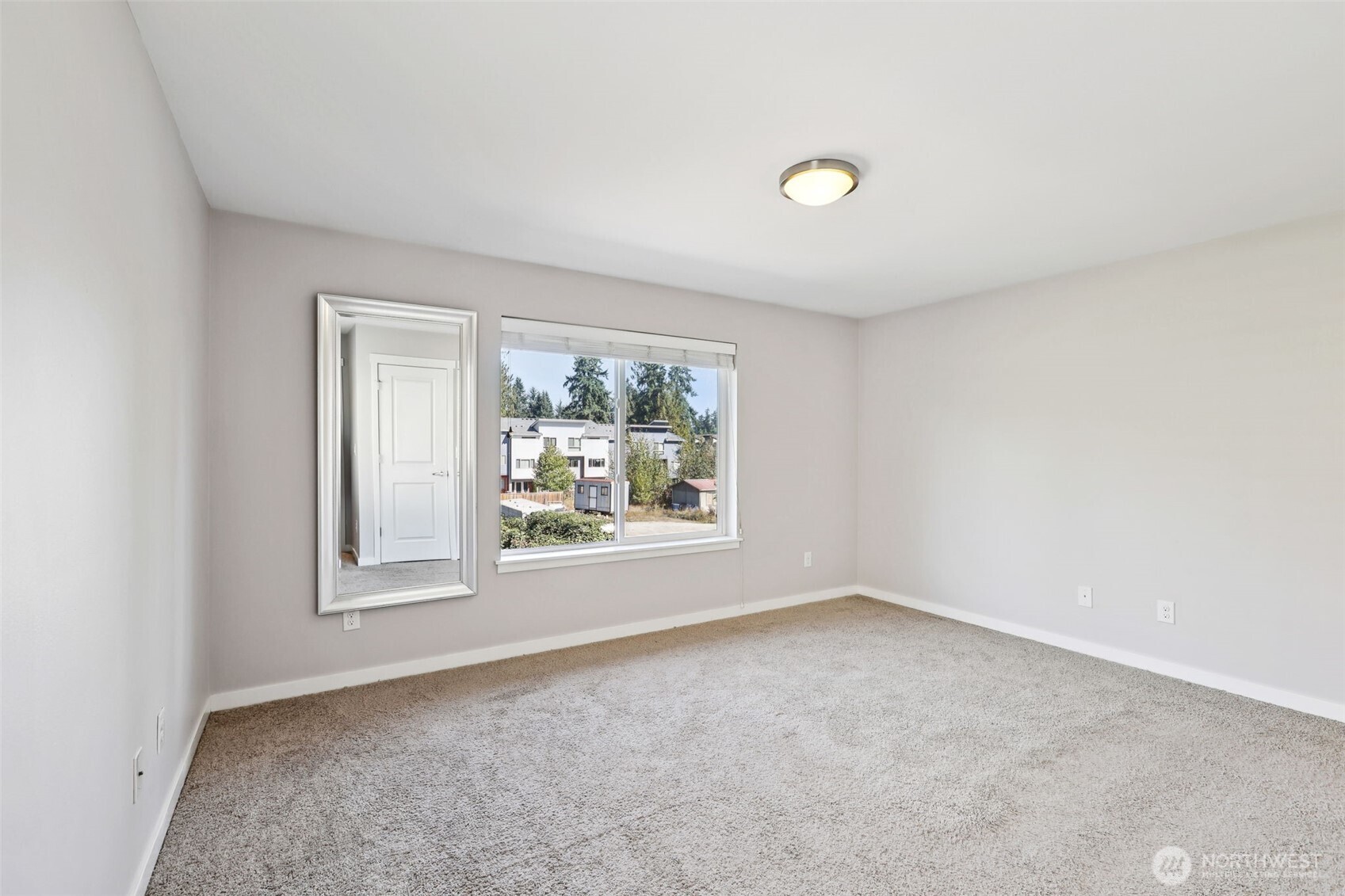 19403 7th Avenue West, Unit C1 Lynnwood, WA 98036 - Photo 25 of 40 an empty room with windows