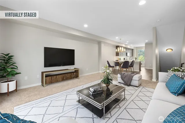 a view of a livingroom with a staircase