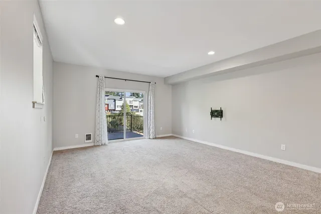 a view of a hallway with staircase