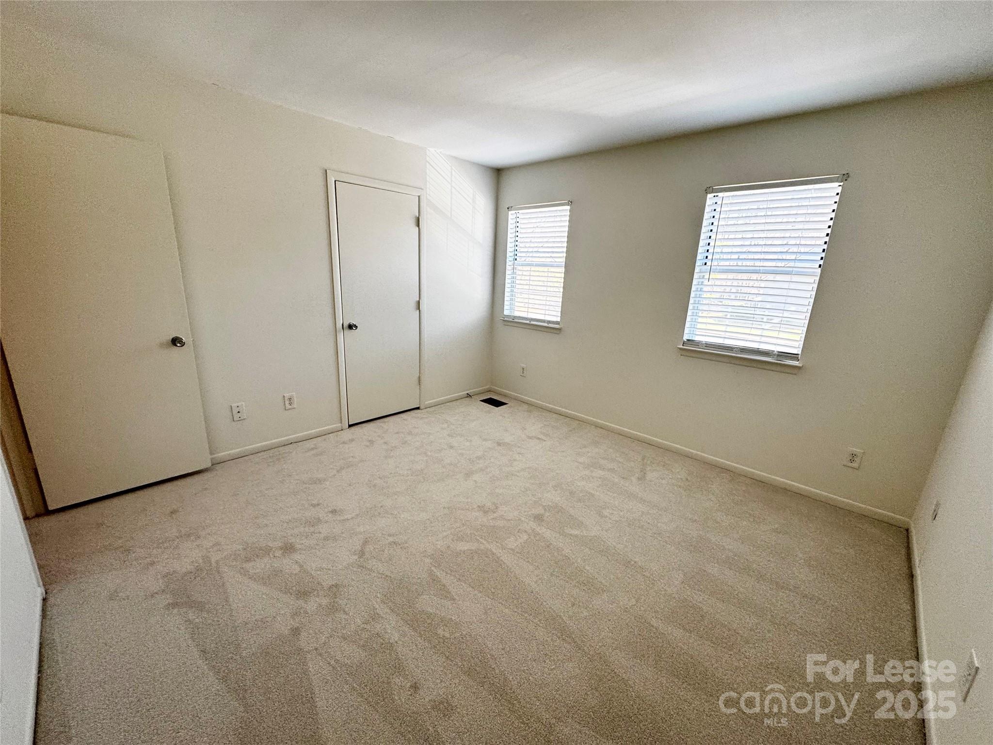 6102 Heath Ridge Court Charlotte, NC 28210 - Photo 13 of 23 a view of an empty room with a window