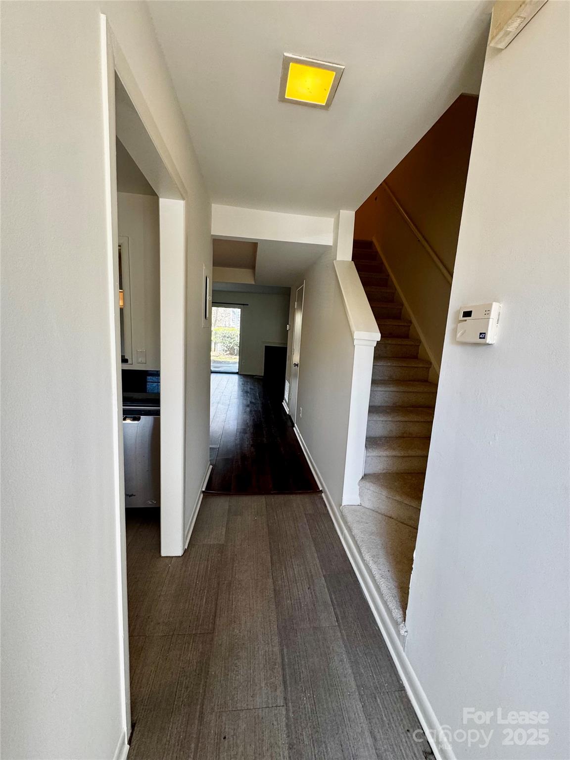 6102 Heath Ridge Court Charlotte, NC 28210 - Photo 19 of 23 a view of entryway and hall with wooden floor