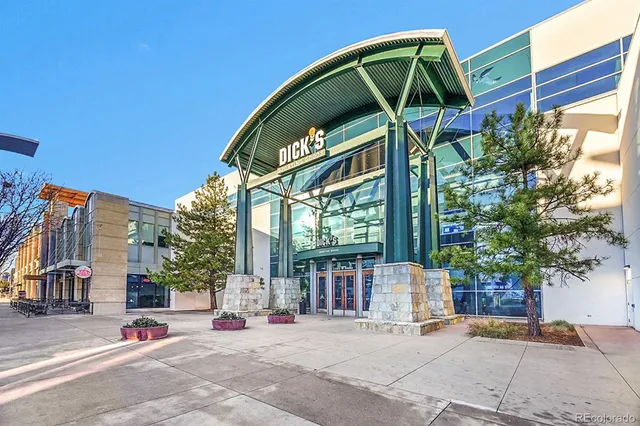 a view of a chair and tables in the patio