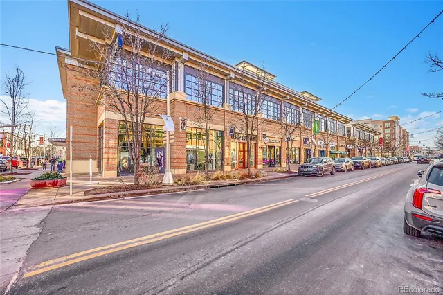 a city street with tall buildings