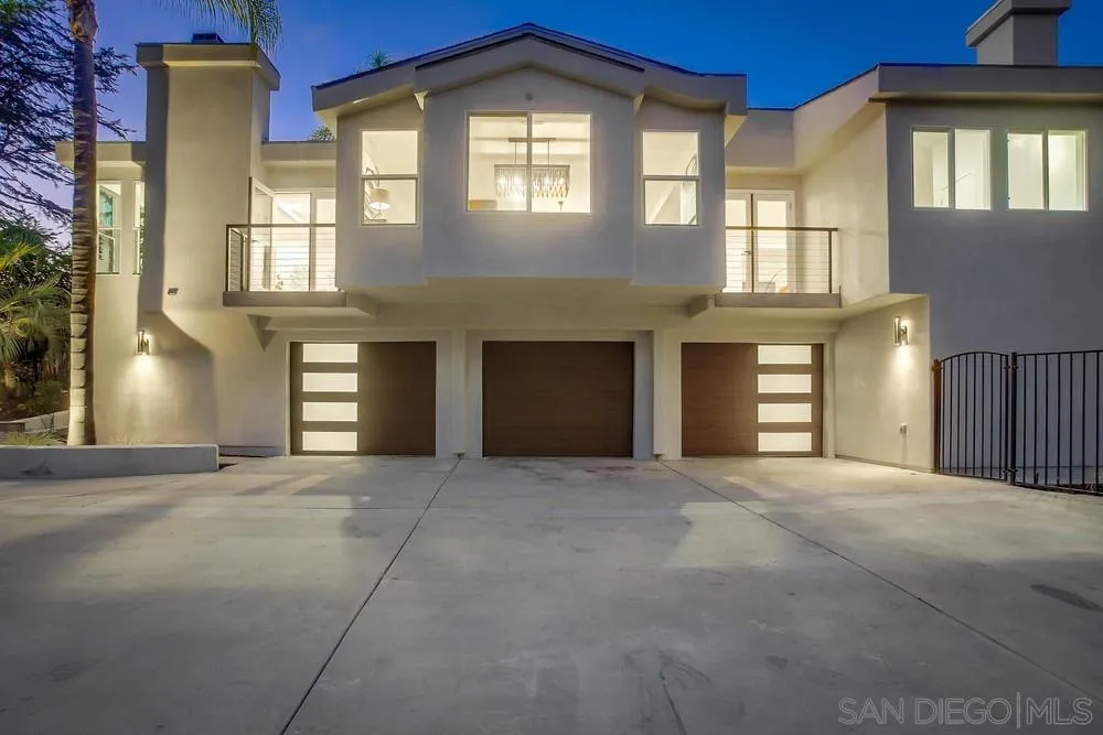 458 Avenida Adobe Escondido, CA 92029 - Photo 12 of 59 a view of an empty room with a fireplace and windows