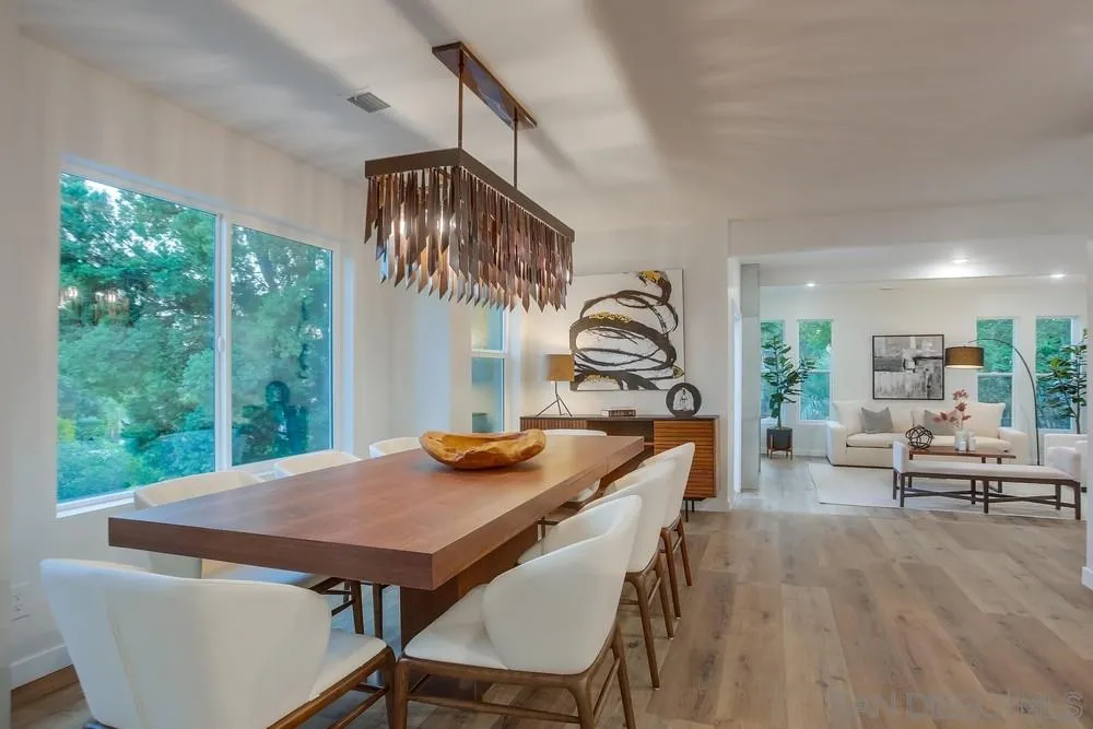 458 Avenida Adobe Escondido, CA 92029 - Photo 17 of 59 a view of a dining table and chairs in the patio