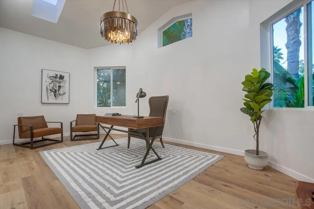 458 Avenida Adobe Escondido, CA 92029 - Photo 21 of 59 a living room with furniture and a potted plant