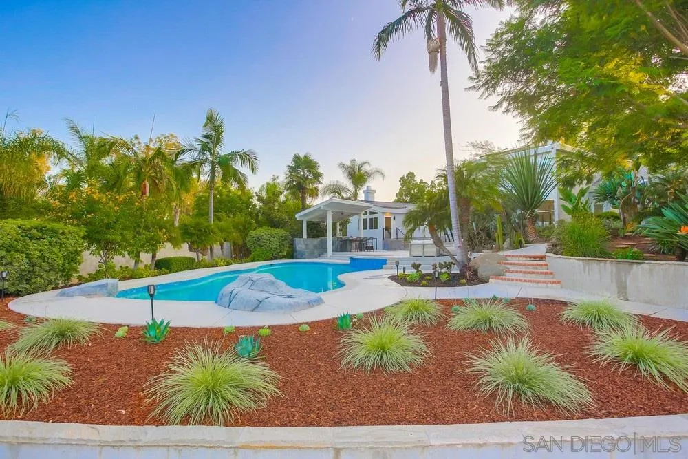 458 Avenida Adobe Escondido, CA 92029 - Photo 26 of 59 a view of a swimming pool with a patio