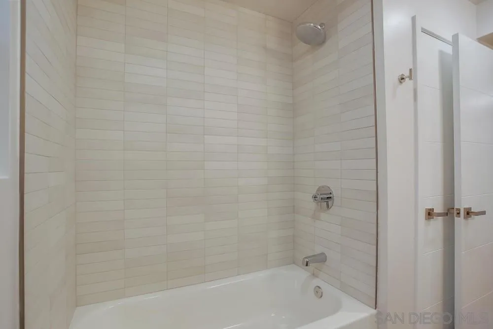 458 Avenida Adobe Escondido, CA 92029 - Photo 33 of 59 a bathroom with a bathtub