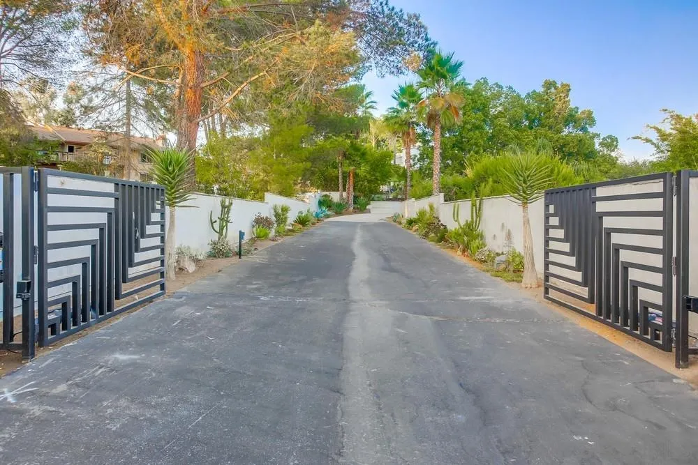 458 Avenida Adobe Escondido, CA 92029 - Photo 41 of 59 a view of a house with a yard and tree s