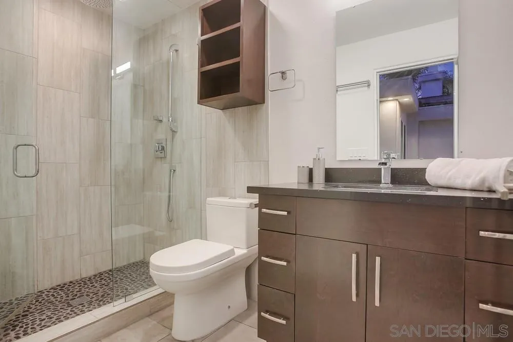 458 Avenida Adobe Escondido, CA 92029 - Photo 58 of 59 a bathroom with a sink a toilet and shower
