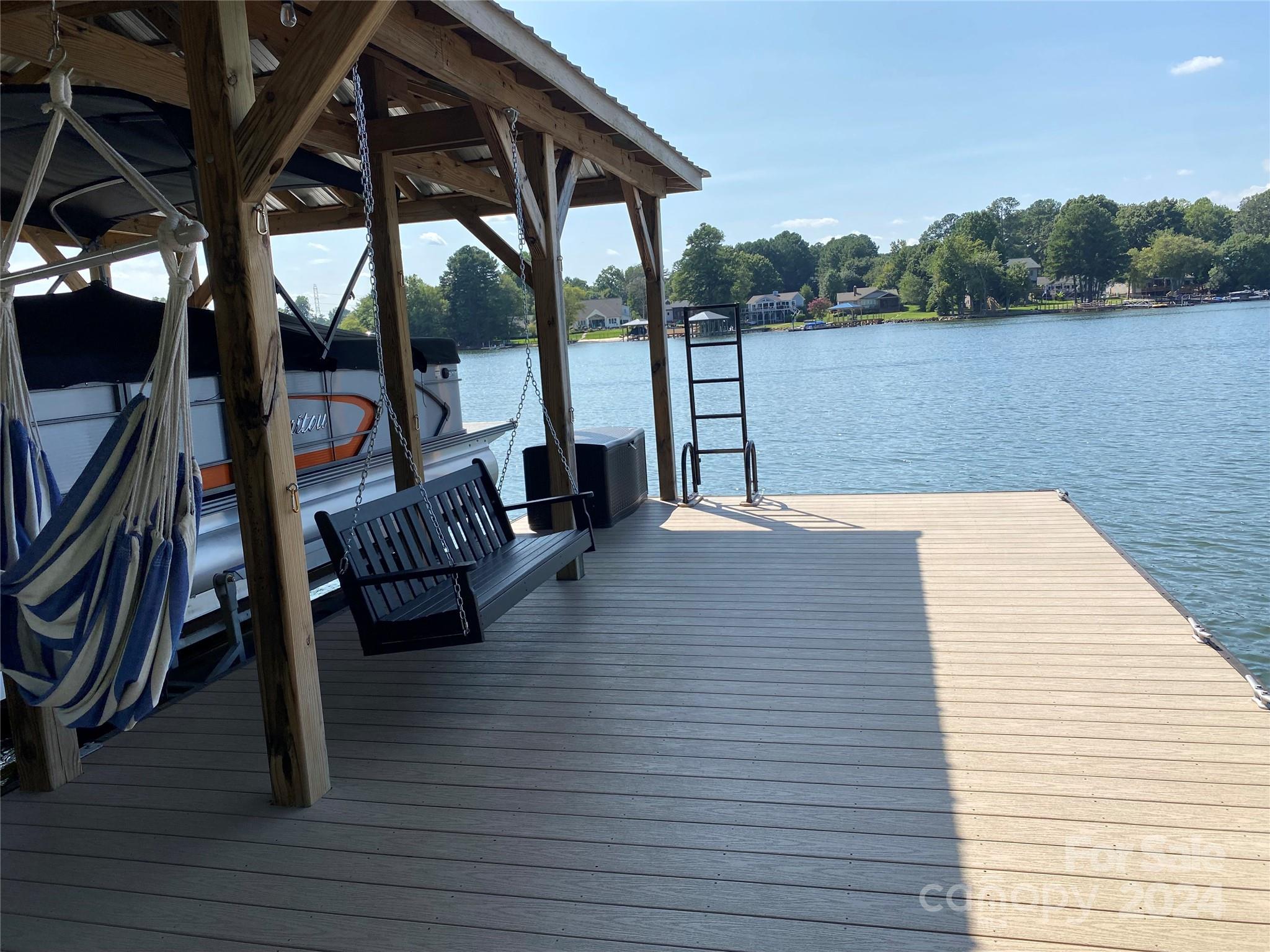 7707 Dellinger Road Denver, NC 28037 - Photo 12 of 46 a terrace with outdoor seating and city view