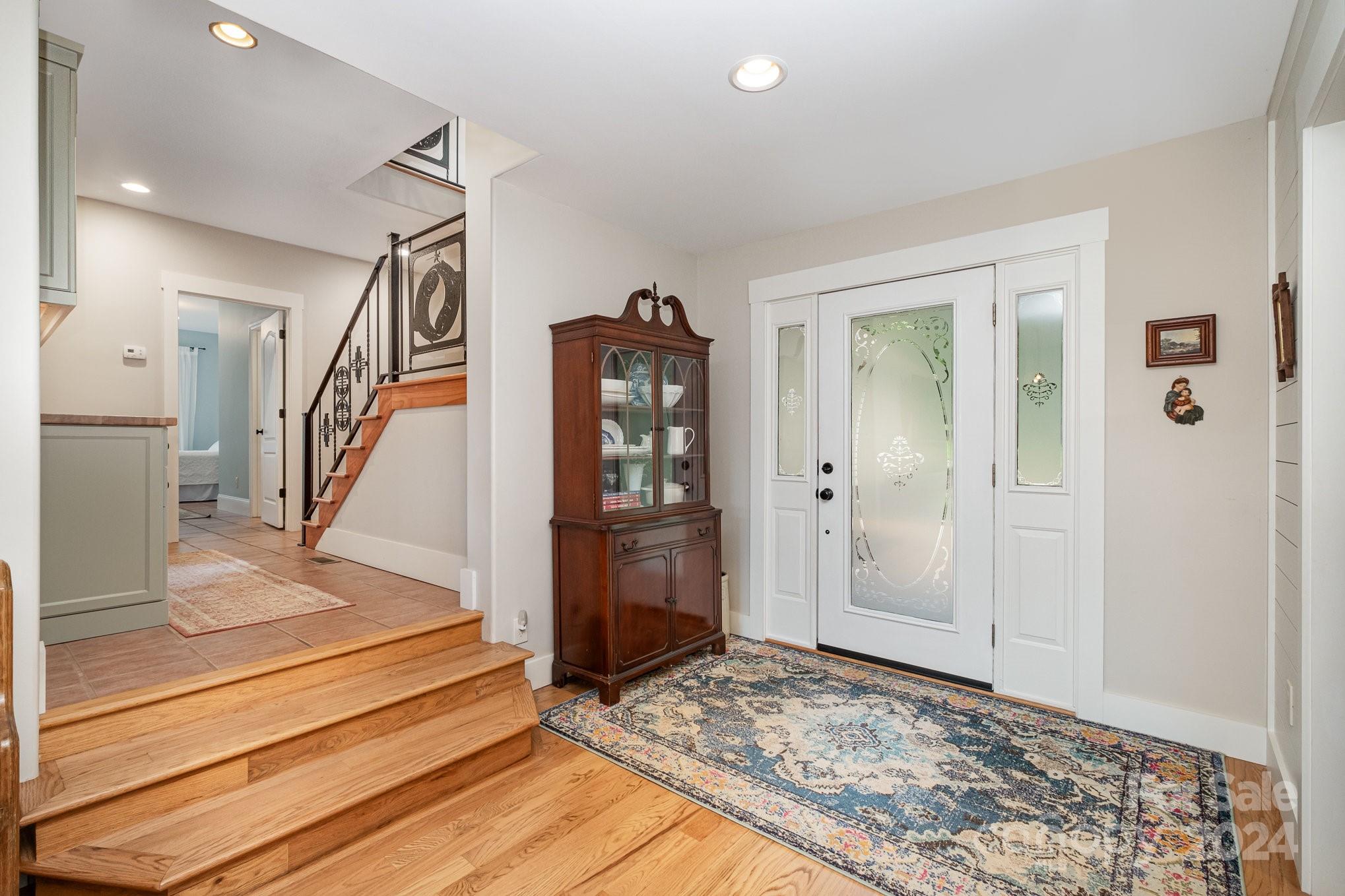 7707 Dellinger Road Denver, NC 28037 - Photo 16 of 46 a view of entryway and hall with wooden floor