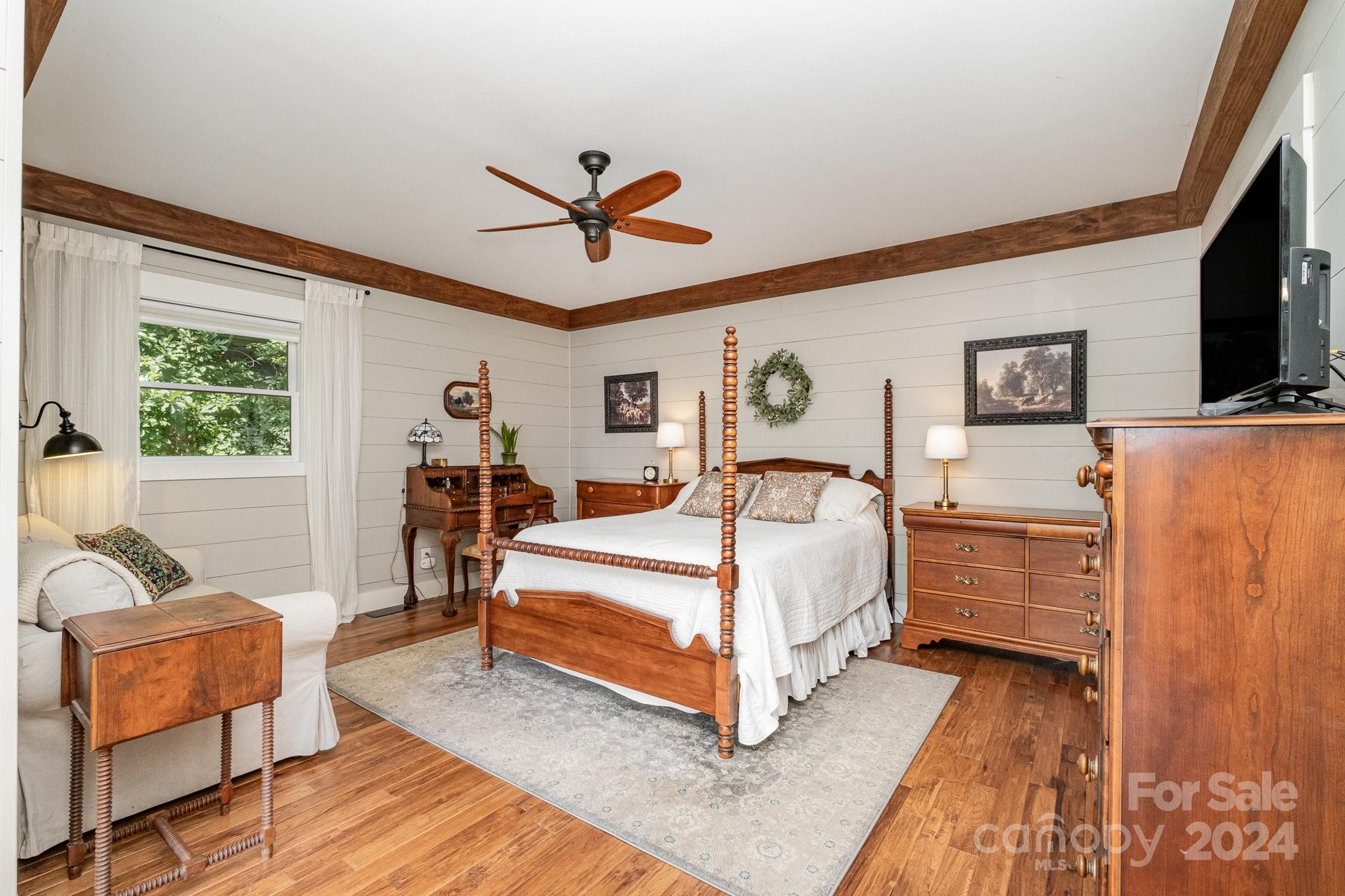 7707 Dellinger Road Denver, NC 28037 - Photo 28 of 46 a bed room with a bed and a couch