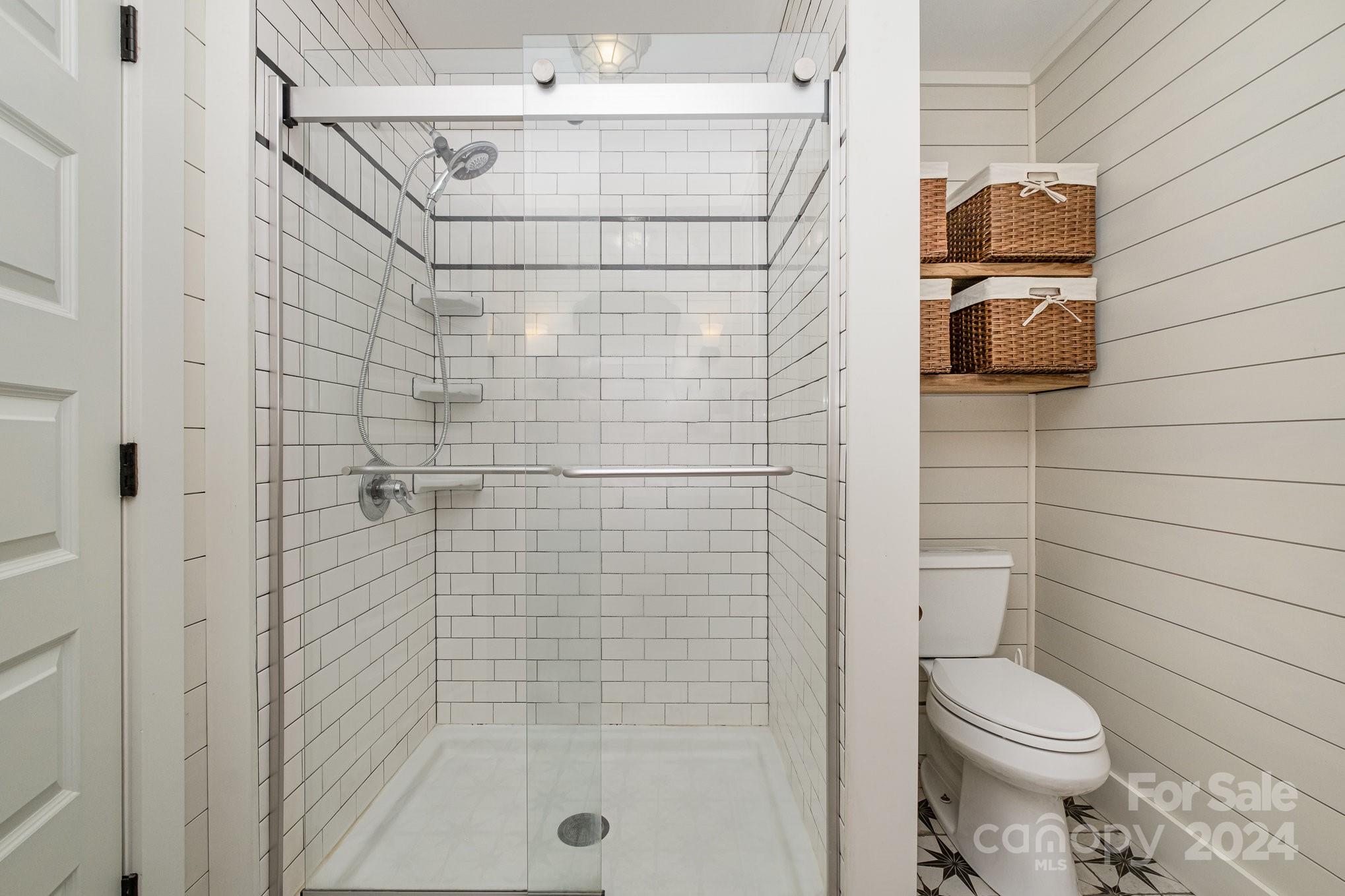 7707 Dellinger Road Denver, NC 28037 - Photo 31 of 46 a bathroom with a toilet and shower