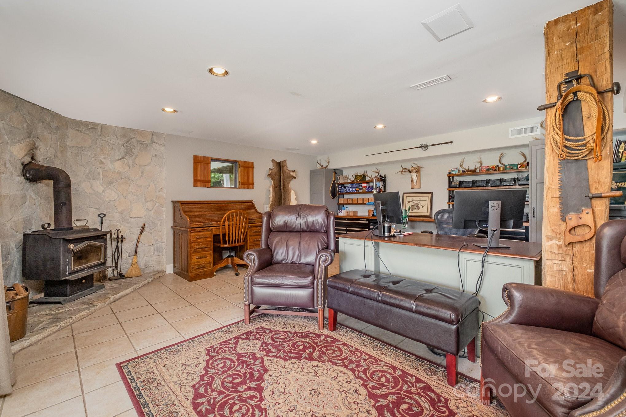 7707 Dellinger Road Denver, NC 28037 - Photo 46 of 46 a living room with furniture and a flat screen tv