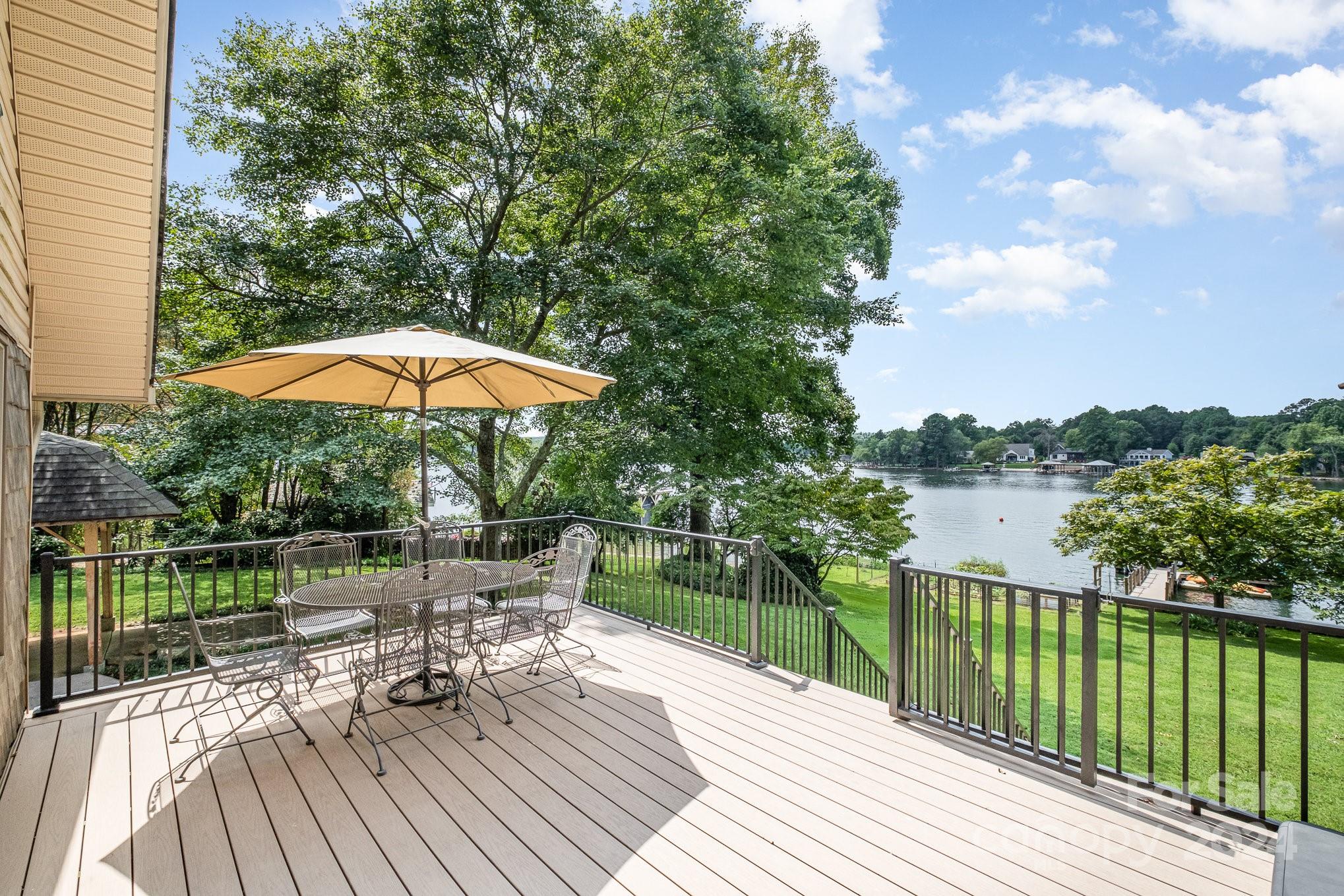 7707 Dellinger Road Denver, NC 28037 - Photo 7 of 46 a view of balcony with outdoor space and lake view