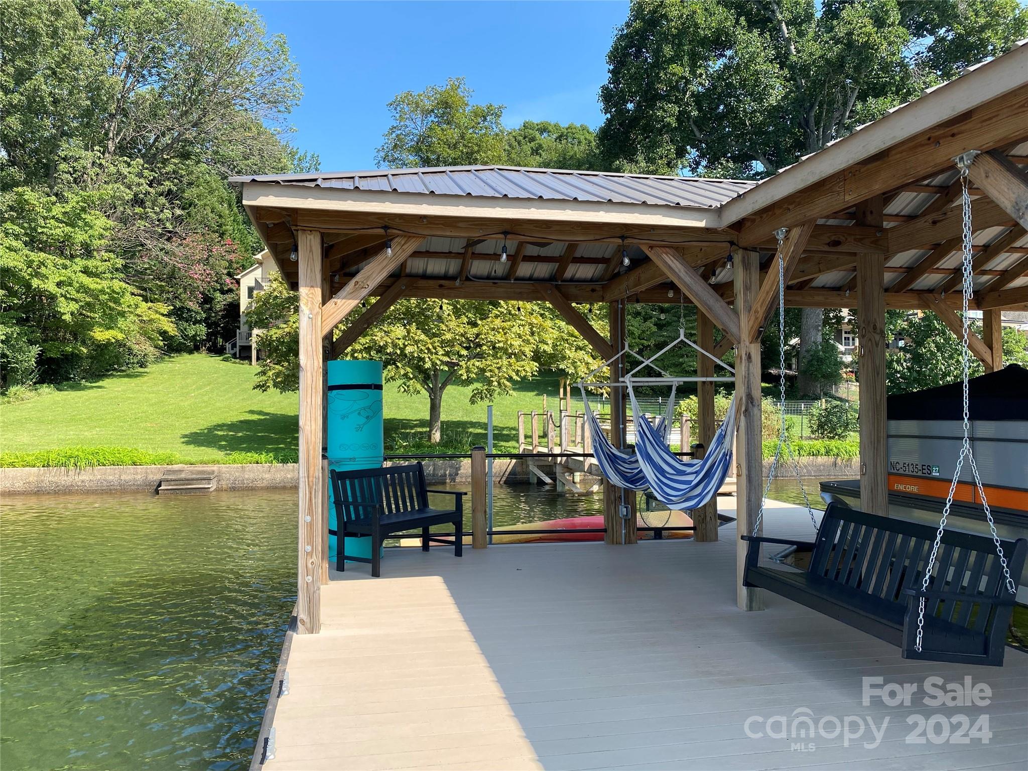 7707 Dellinger Road Denver, NC 28037 - Photo 10 of 46 a view of a swimming pool with a patio