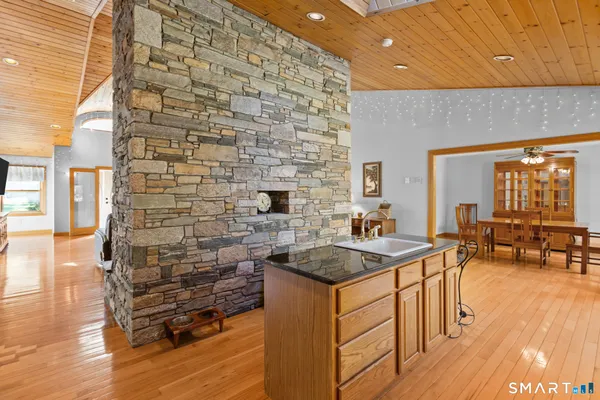 a kitchen that has a sink and a stove
